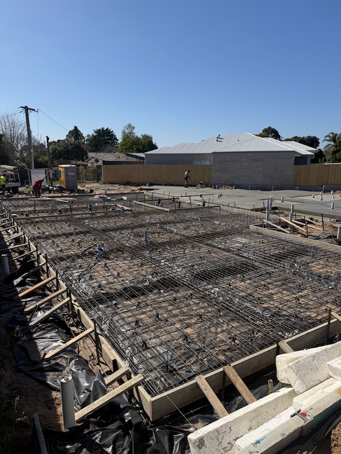 Steel reinforcement mesh and formwork set out, ready for a slab pour